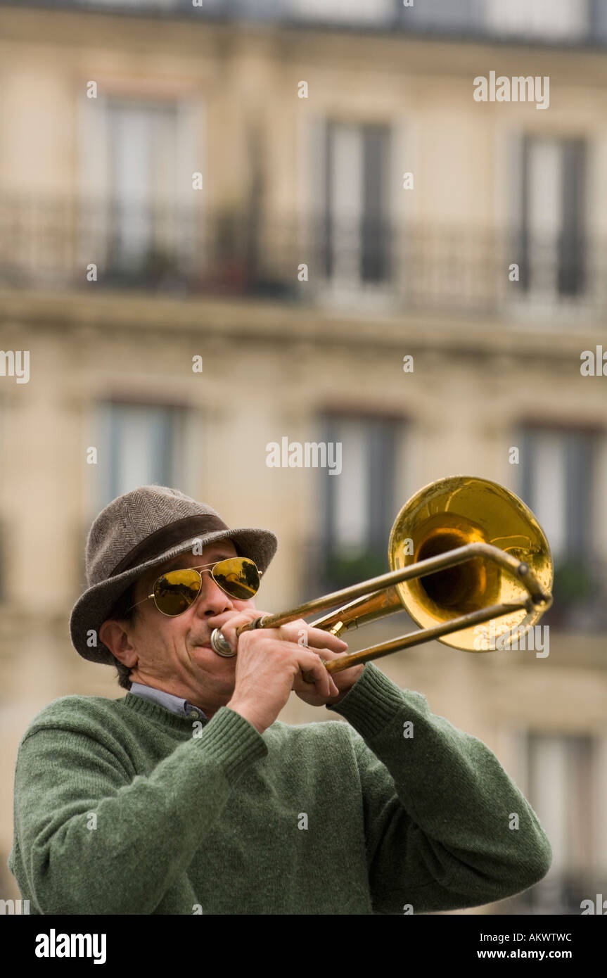 France, Paris, Street band trombone player Stock Photo Alamy