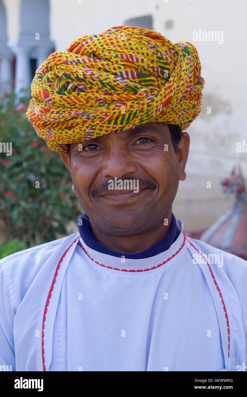 A Rajasthani musician outside the old palace of Bhadrawati in Bhandarej, Rajasthan, India. - Stock Image