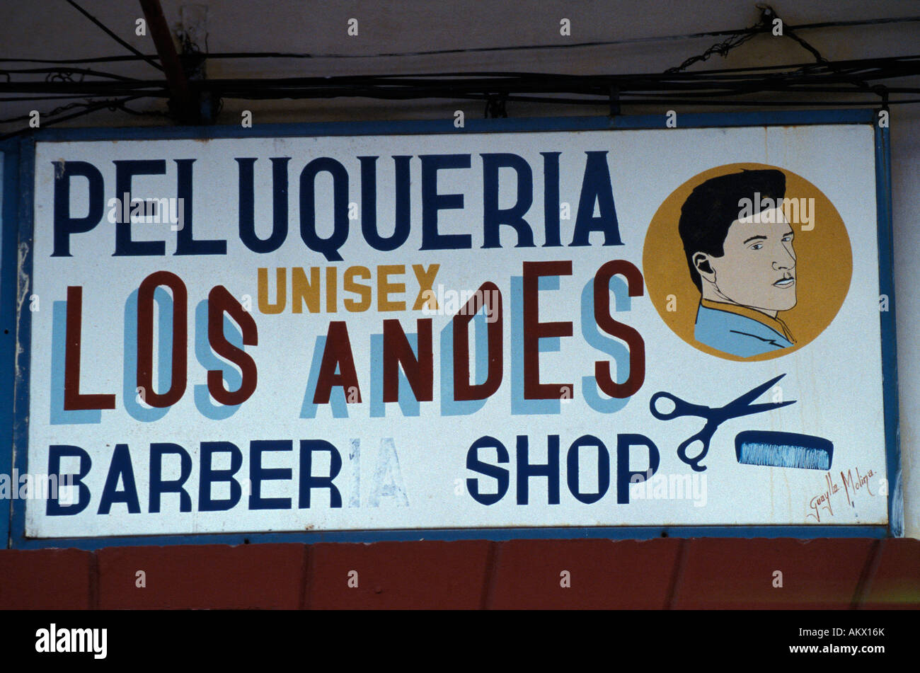 Unisex barbershop sign, Riobamba, Ecuador Stock Photo