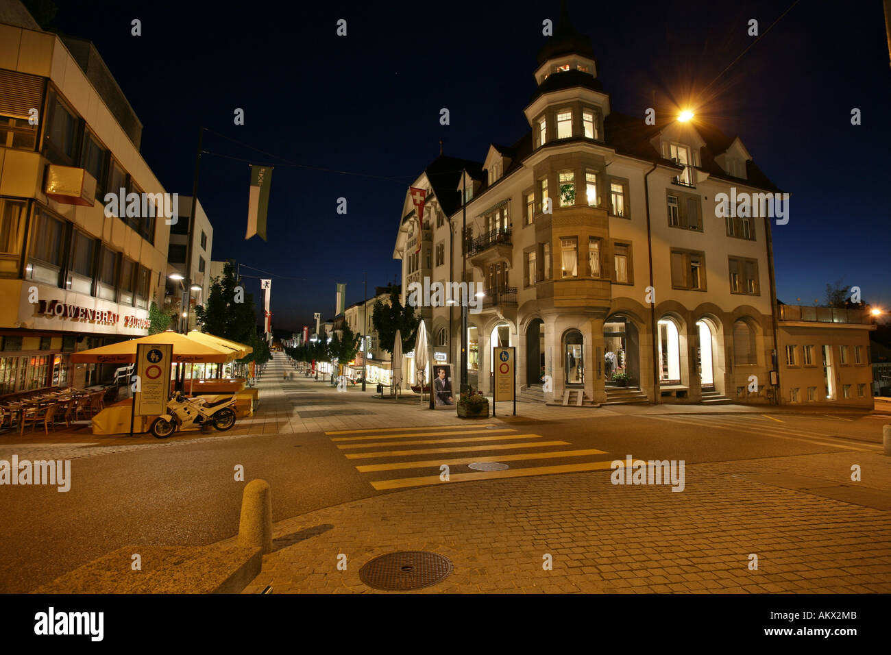 The brightly lit pedestrian area apparently extends to the horizon, Wil, St. Gallen, Switzerland Stock Photo