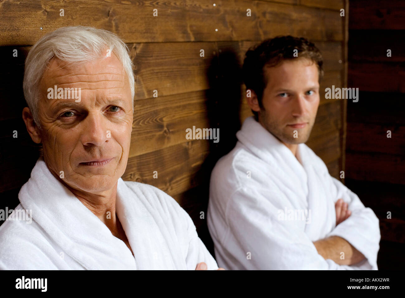 Germany, two men in bathrobe, portrait Stock Photo Alamy