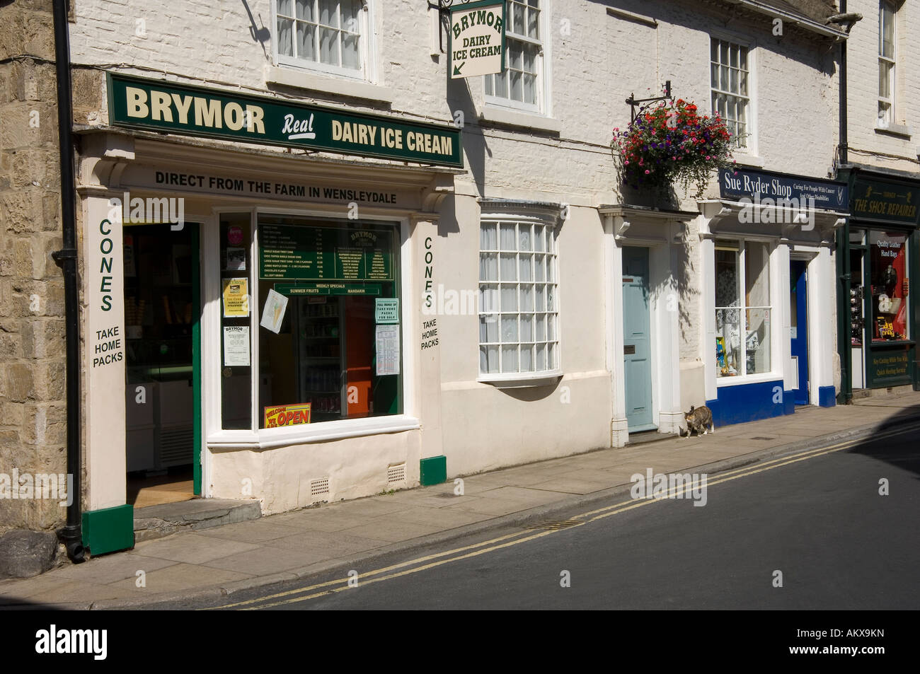 Row of shops stores in summer Knaresborough North Yorkshire England UK