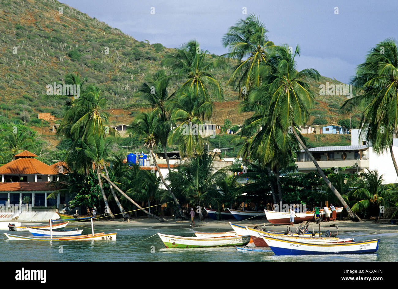 Venezuela, Nueva Esparta State, Margarita Island, Pampatar, fishing boats mooring in front of the beach Stock Photo
