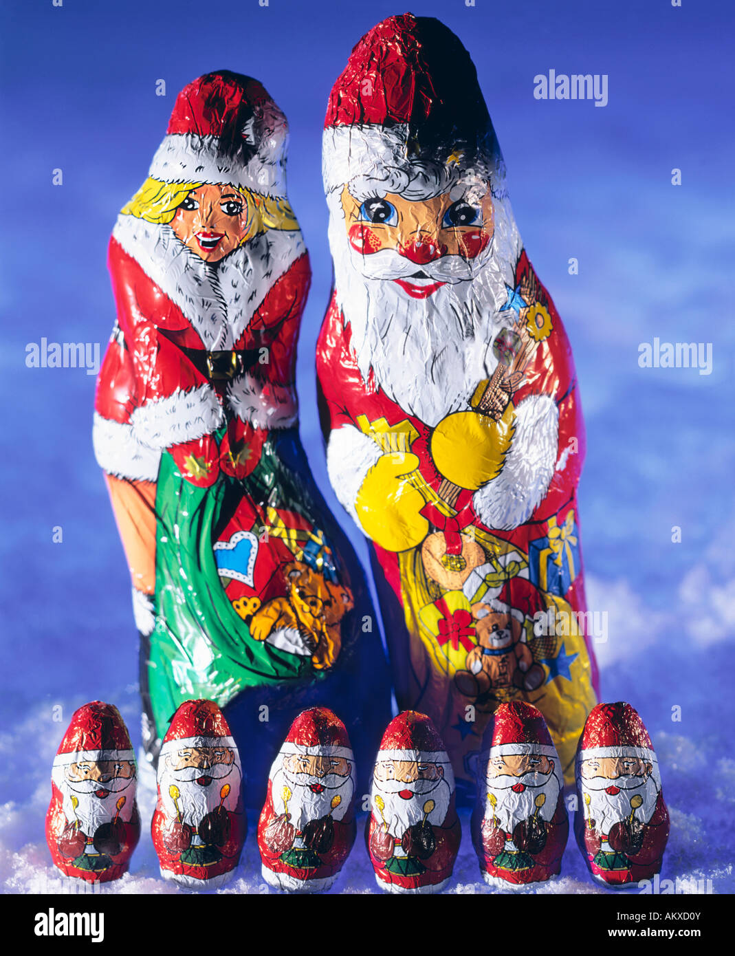 Chocolate Santa Claus, Santa Claus girl and small Santa Clauses Stock Photo