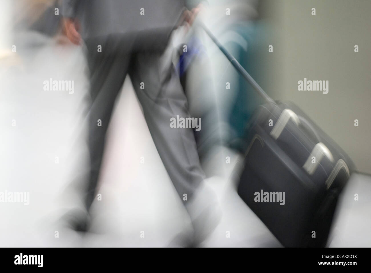 Businessman with suitcase Stock Photo