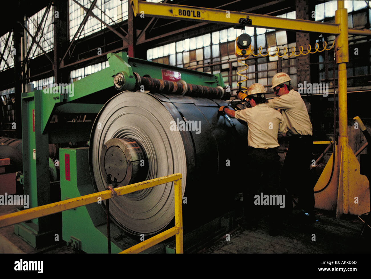 Men operating machinery at steel fabrication plant Birmingham Alabama Copperweld Stock Photo
