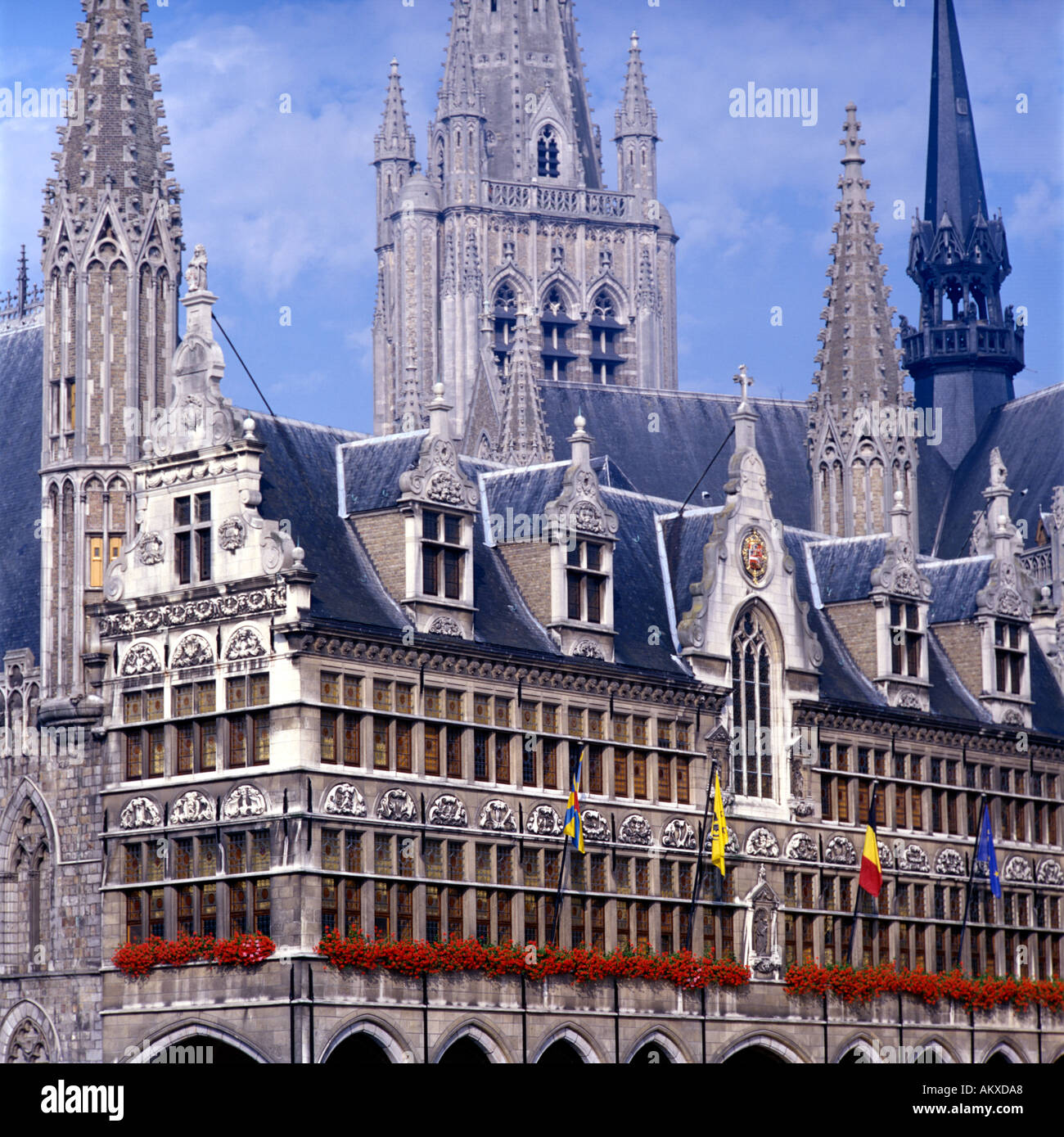 Spires and turrets of City Hall Cloth Hall and Cathedral at Ypres Belgium Stock Photo