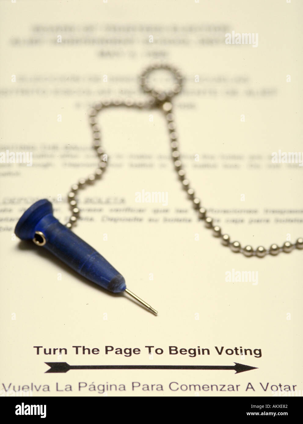 Punch pin on ballot in voting booth Texas Stock Photo