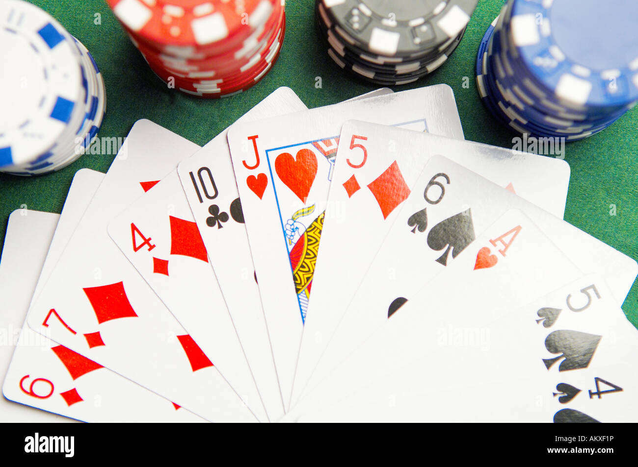 Cards of a Poker Game with Chips Stock Photo Alamy
