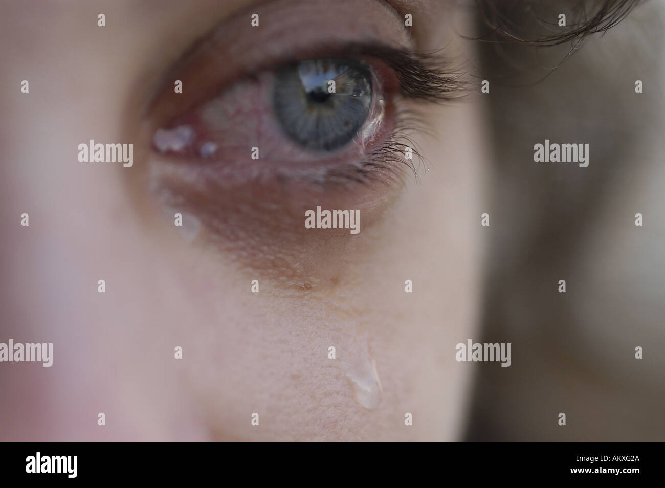 A closeup of a woman's eye teared up Stock Photo Alamy