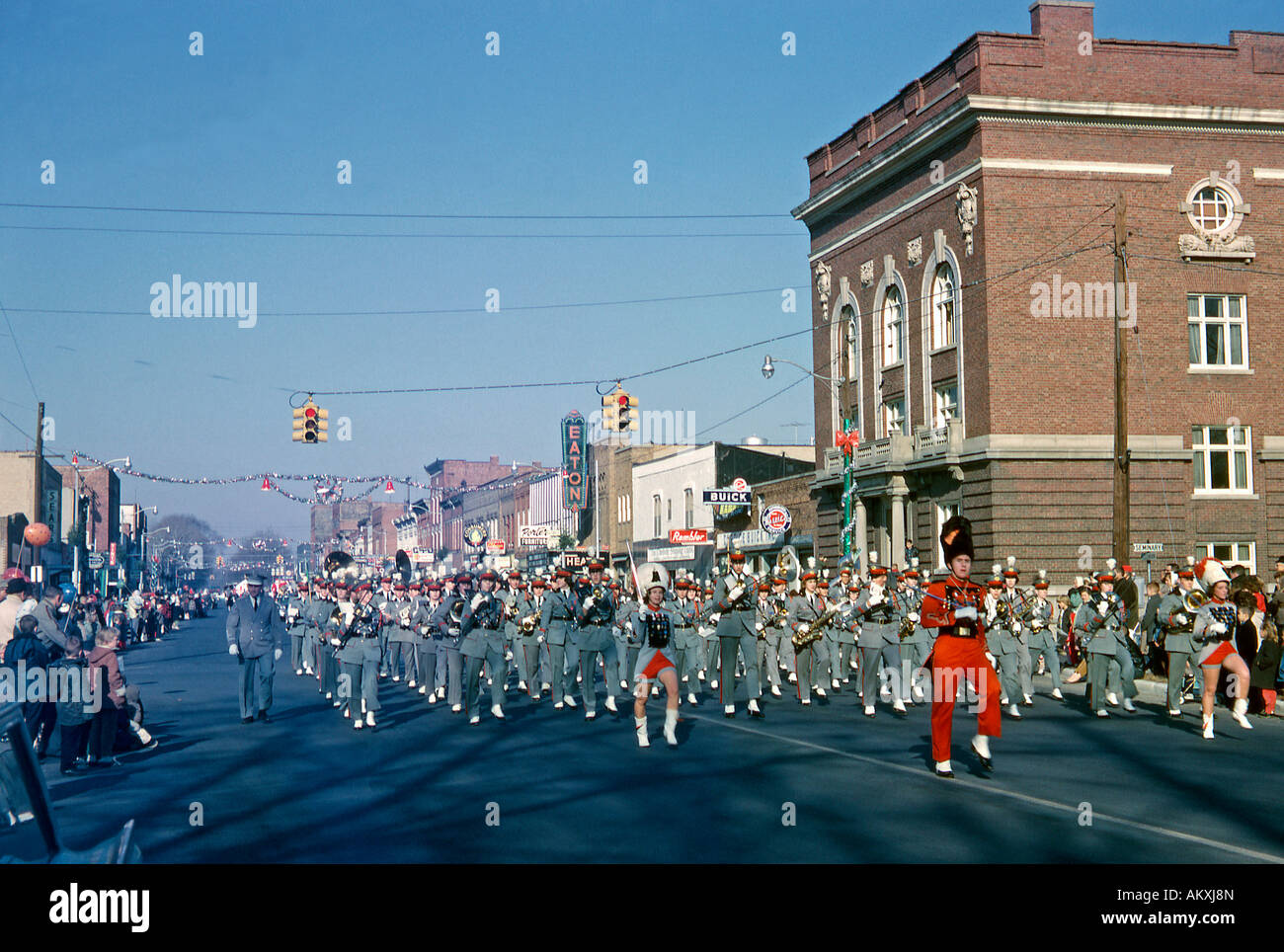 A Marching band at the annual Christmas Parade along the main street at Charlotte, Michigan, USA in 1963 Stock Photo