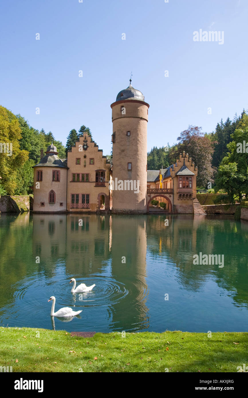 The moated castle Mespelbrunn is located in a remote side valley of the Elsava valley in Spessart, Bavaria, Germany. Stock Photo