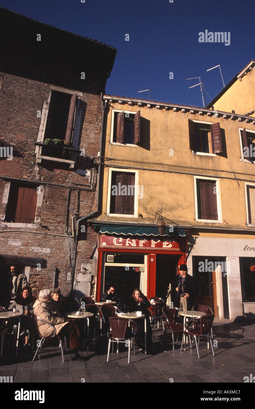 VENICE, ITALY. Customers sitting outside the Cafe Rosso on Campo Santa Margherita in Dorsoduro. Stock Photo