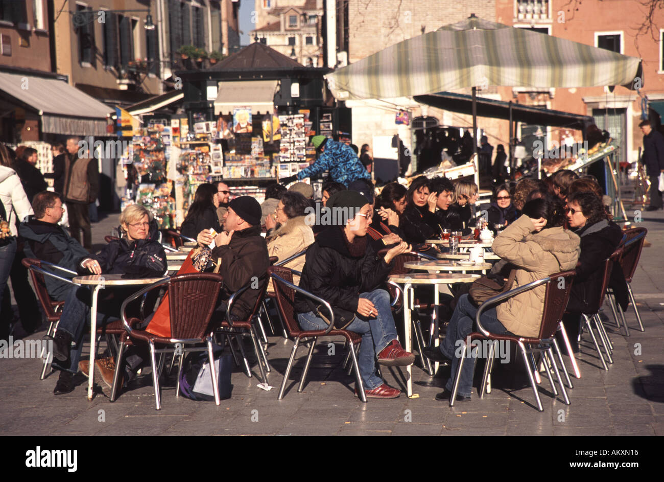 VENICE, ITALY People enjoying the winter sun on Campo Santa Margherita in Dorsoduro. Stock Photo