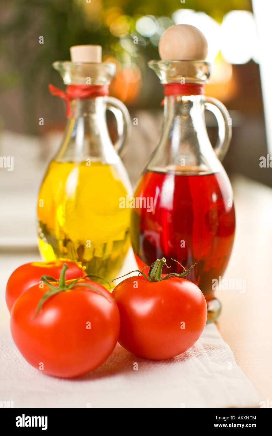 Tomatoes with oil and vinegar Stock Photo Alamy