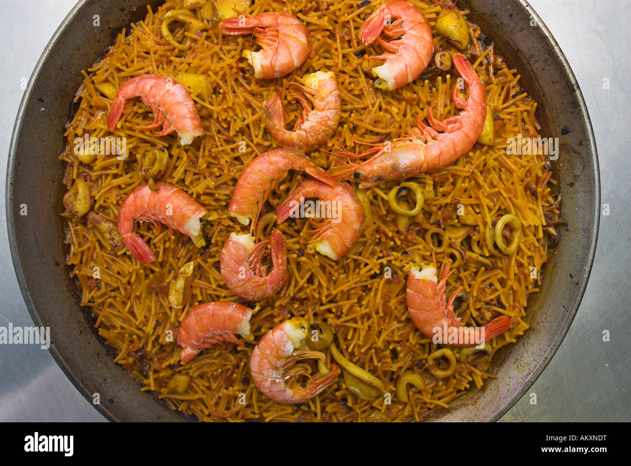 a spanish fideua, a typical noodles casserole with seafood Stock Photo -  Alamy