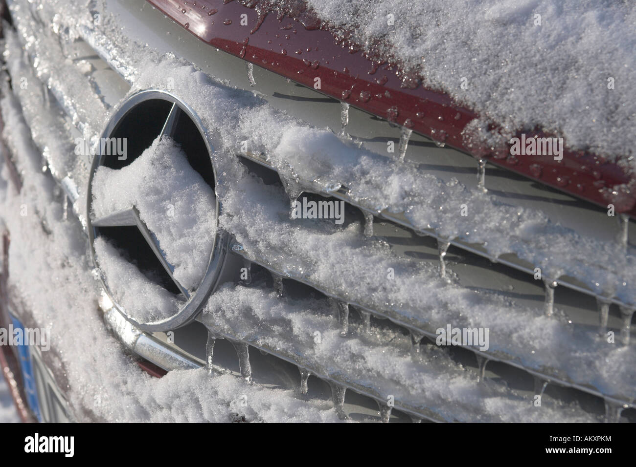 A Mercedes Benz car is cleaned with a broom from snow and ice, Germany  Stock Photo - Alamy
