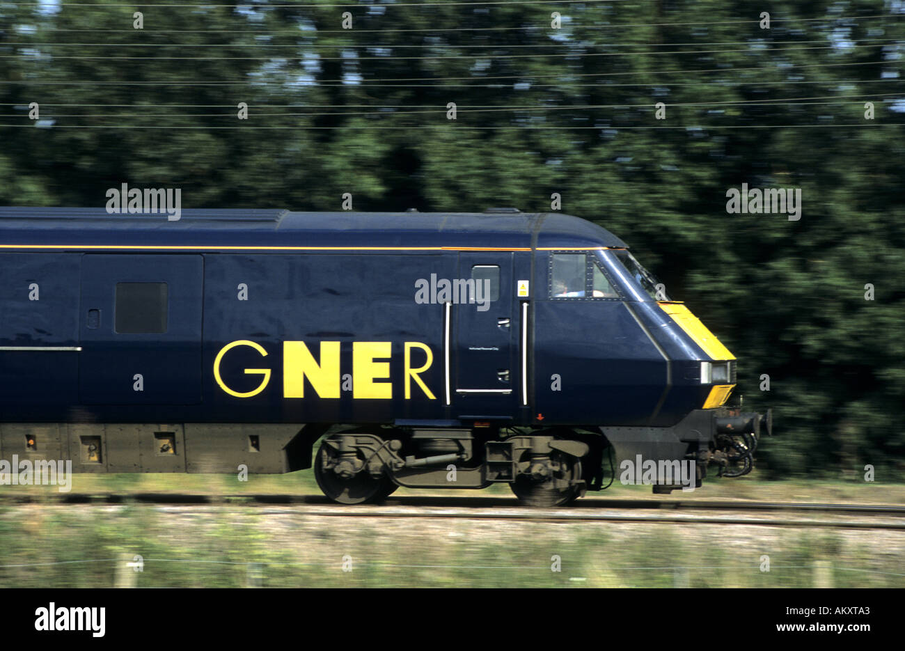 GNER Intercity 225 train at speed on East Coast Main Line, Cambridgeshire, England, UK Stock Photo