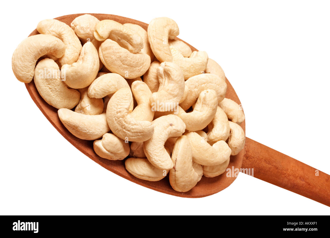 CASHEW NUTS ON SPOON CUT OUT Stock Photo