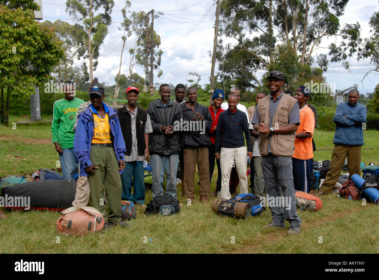 Local mountain guide with assembled porters at Marangu Gate Kilimanjaro Tanzania Stock Photo