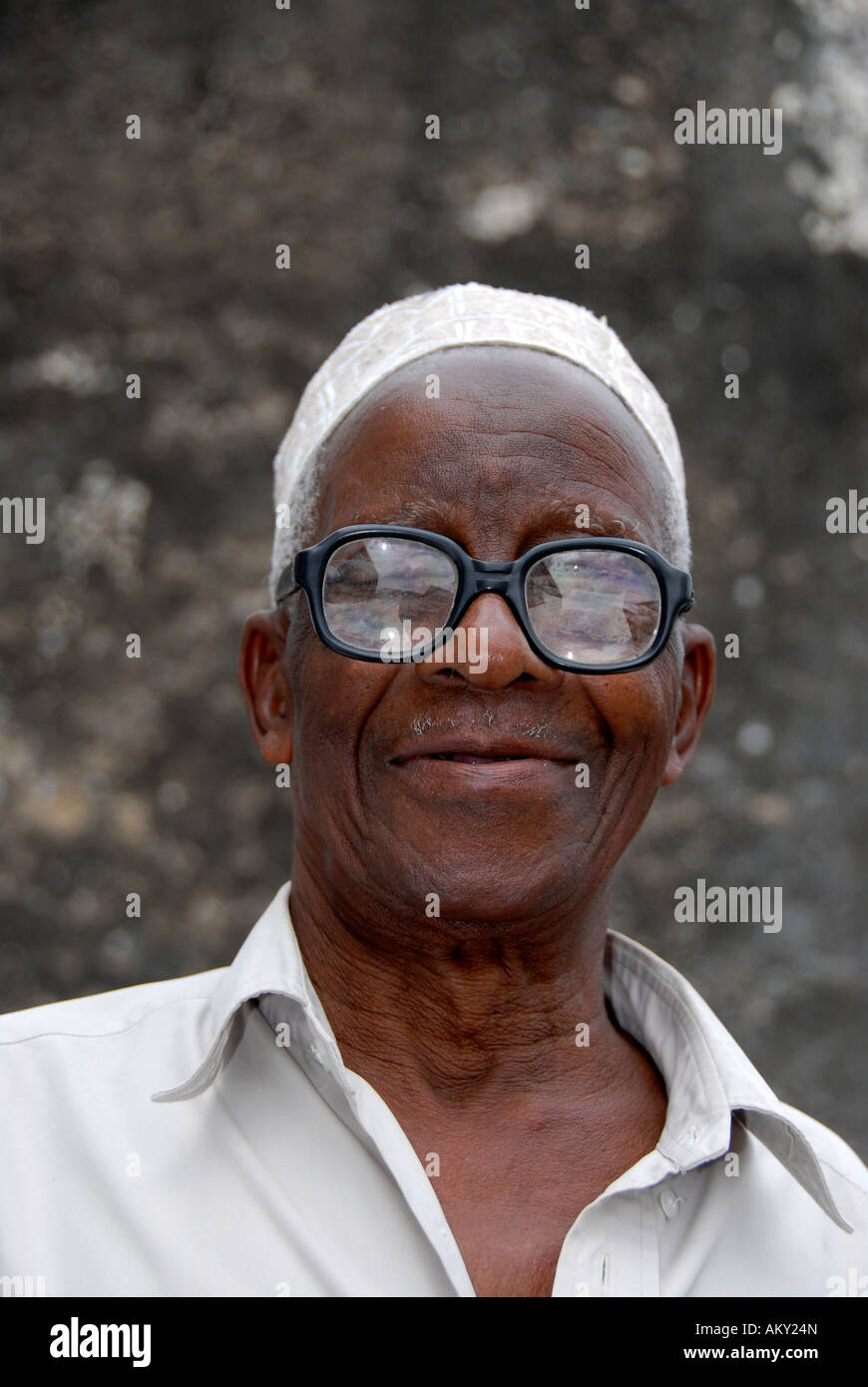 Portrait of a local man with glasses Stone Town Zanzibar Tanzania Stock Photo