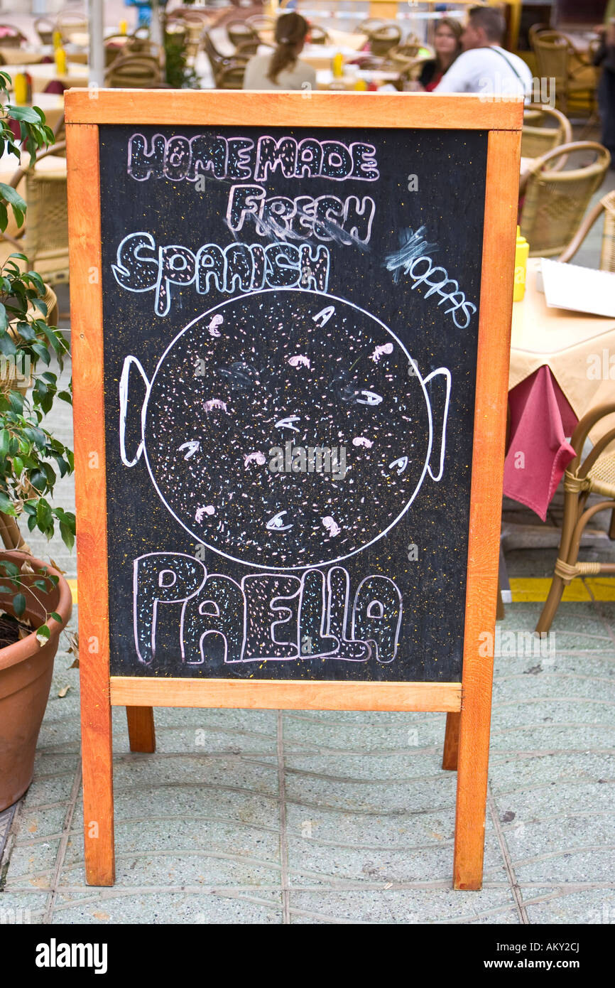 Restaurant sign promoting Paella, Ibiza, Baleares, Spain Stock Photo