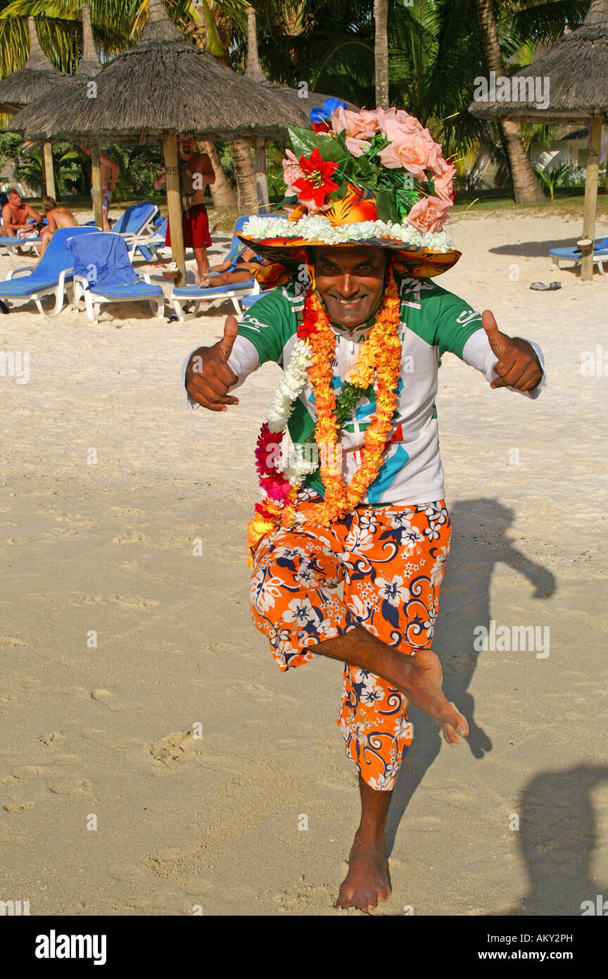 Beach salesman with colourful hat at Trou aux Biches, Mauritius, Mascarenes, Indian Ocean Stock Photo
