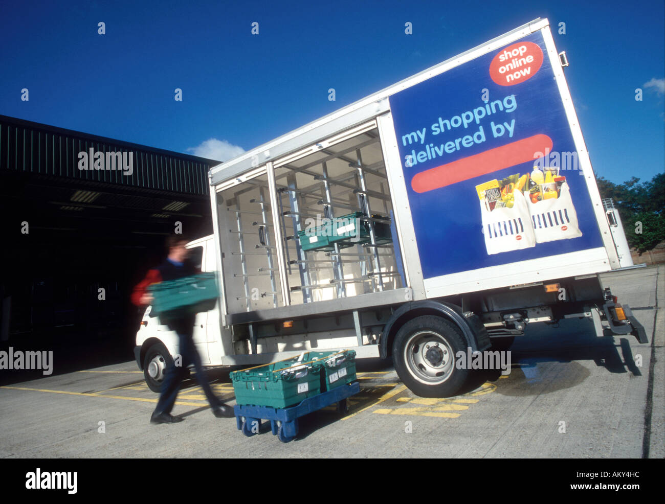 Delivery van being loaded with internet shopping orders Stock Photo