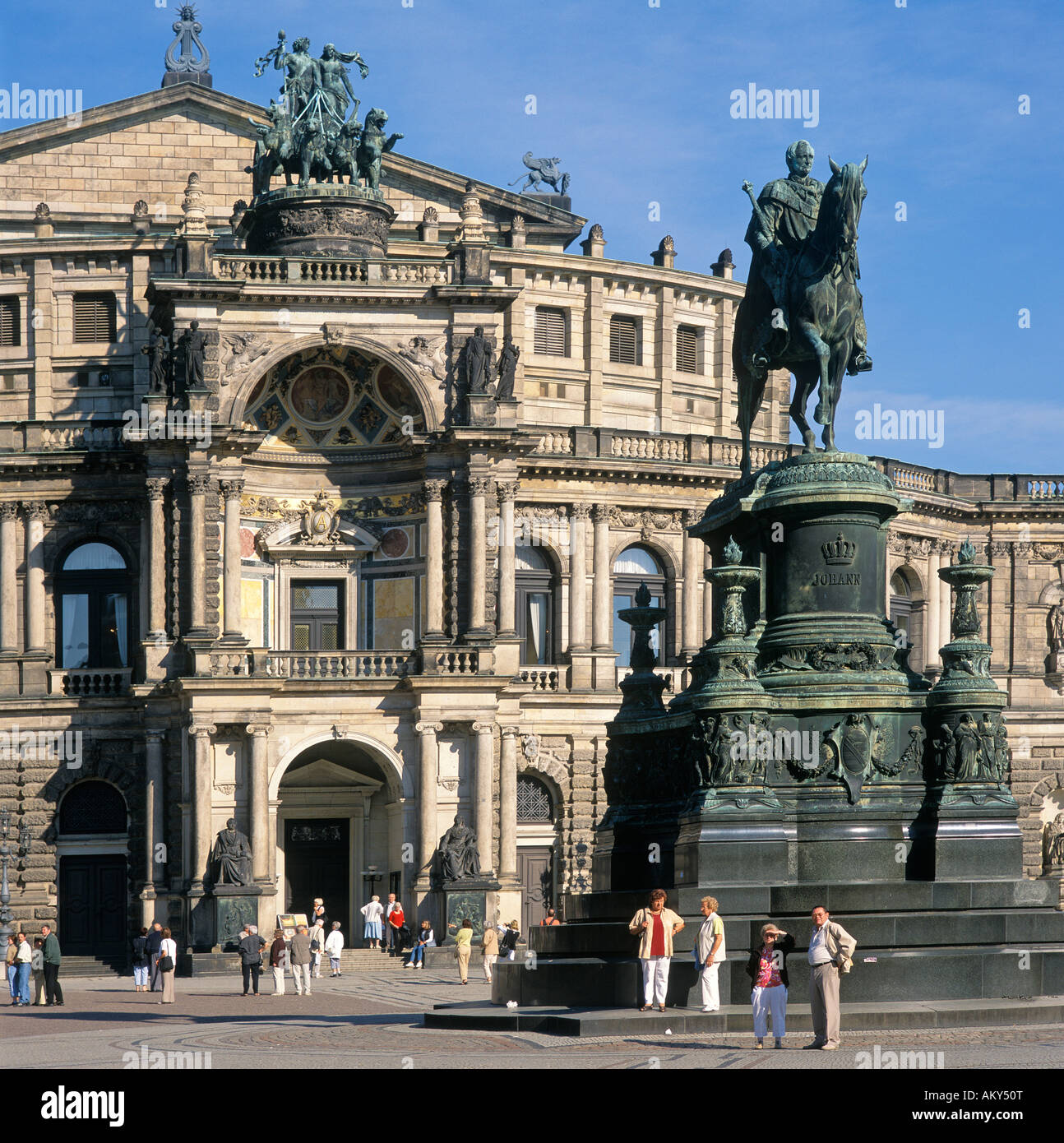 Dresden Saxony Germany Theaterplatz theater square Semperoper opera built by Gottfried Semper with the monument of king Johann  Stock Photo