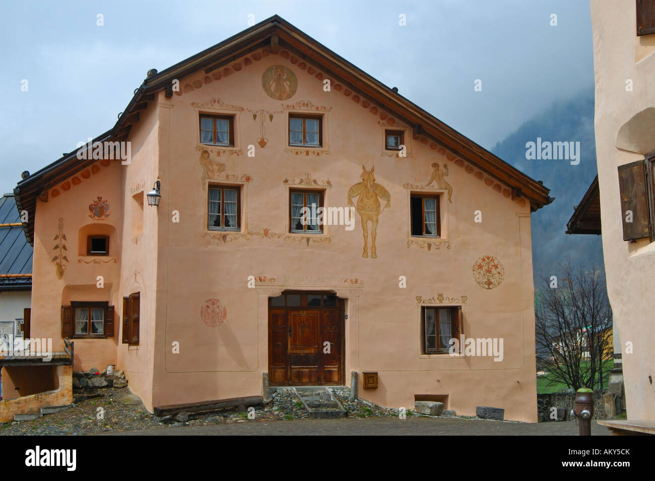 Façade of a typical Engadine house decorated with Sgraffito ornaments, Guarda, Engadin, Switzerland Stock Photo