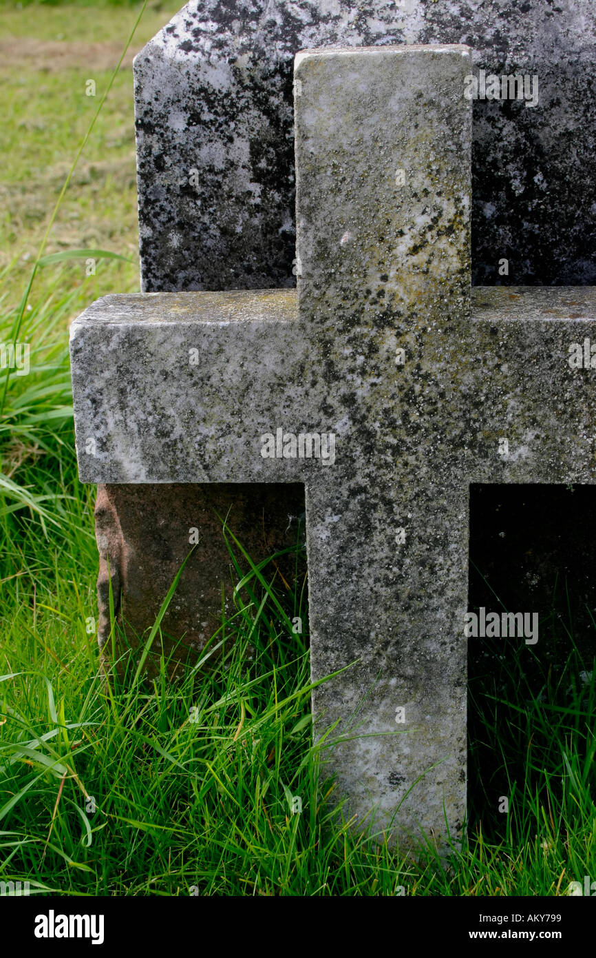 Cross in graveyard Stock Photo