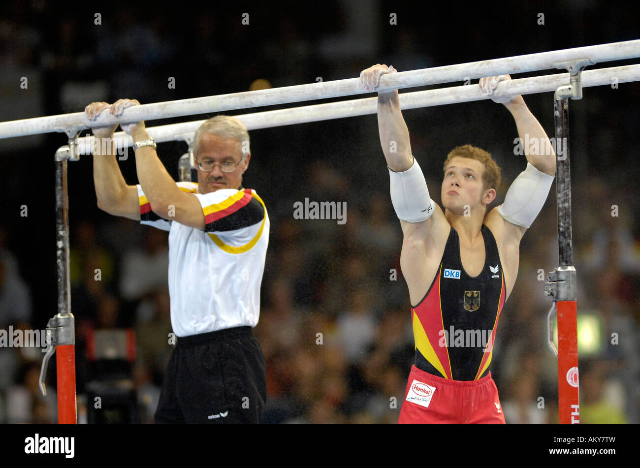 Artistic Gymnastics Fabian HAMBUeCHEN GER and father and coach Wolfgang on parallel bars Artistic Gymnastics World Championship Stock Photo