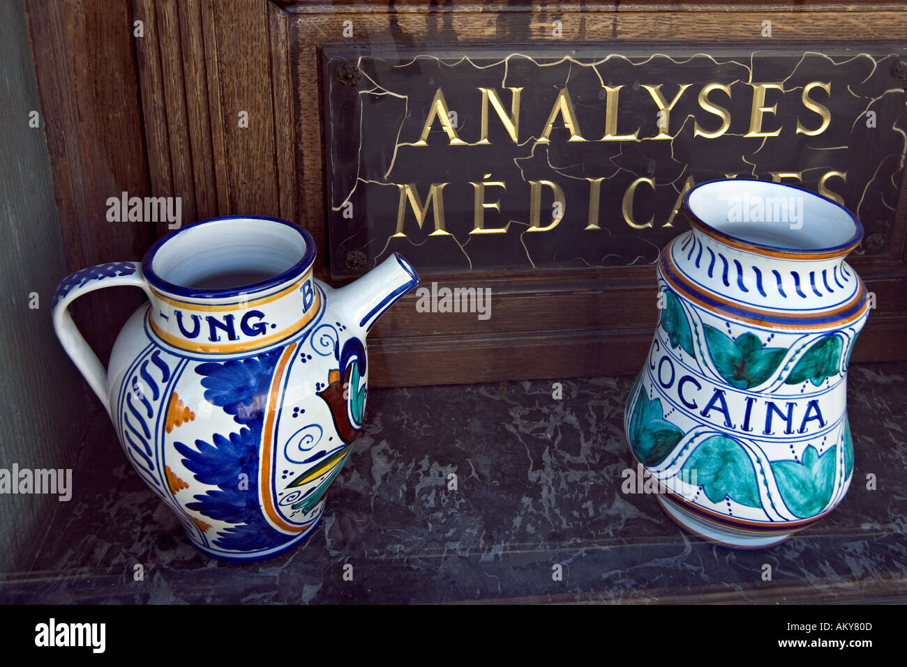 Hand painted 18th 19th century ceramic jars in the window of a chemist shop in Paris France Stock Photo