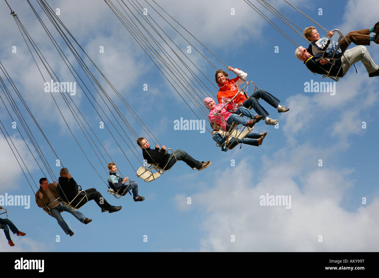 People driving with a chairoplane, Hamburg, Germany Stock Photo