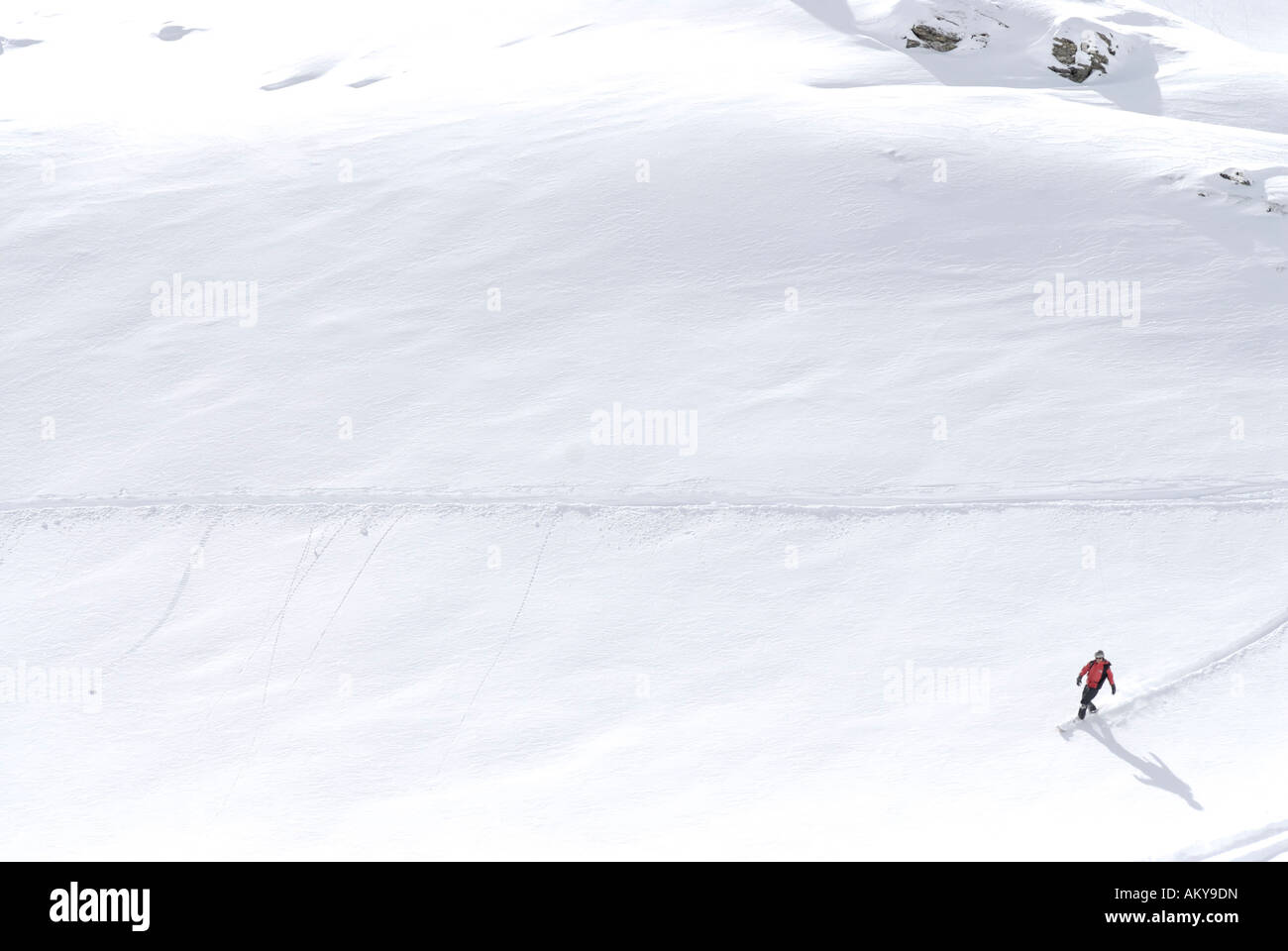 Lonely skier in the deep snow Stock Photo