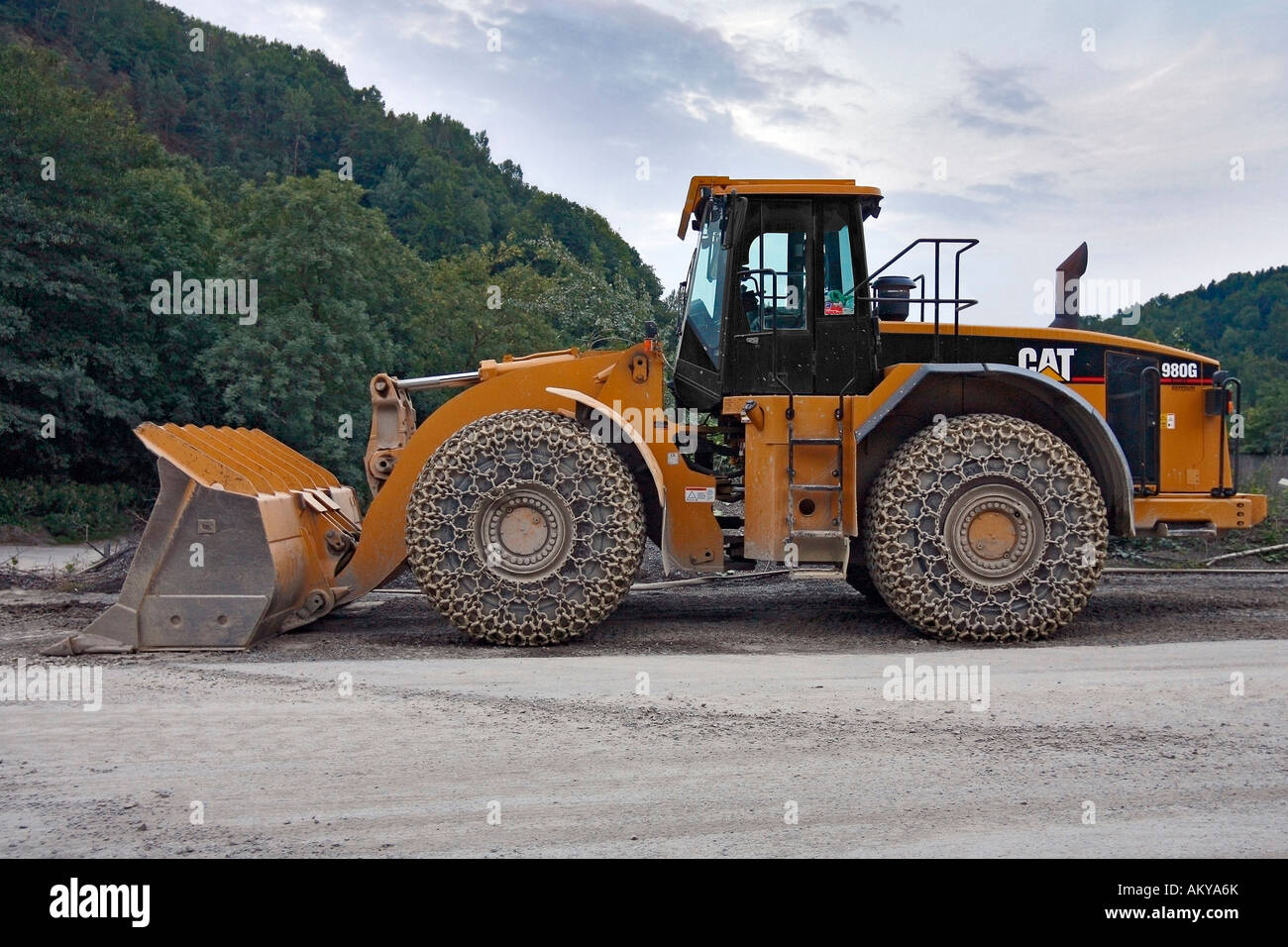 Large wheel loader with tire chains in a quarry Stock Photo 15097002