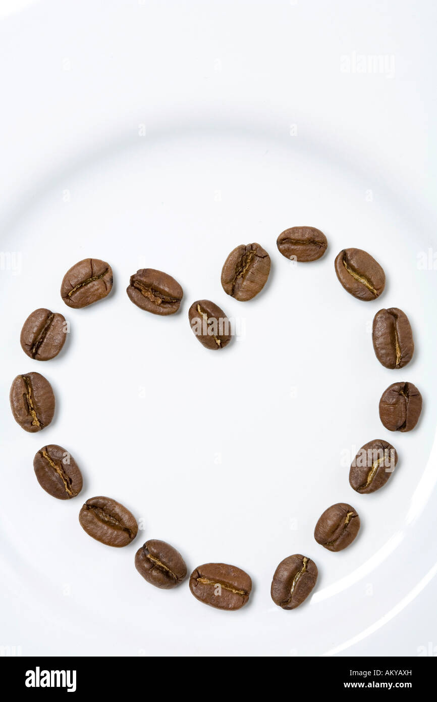Heart of coffee on a plate Stock Photo
