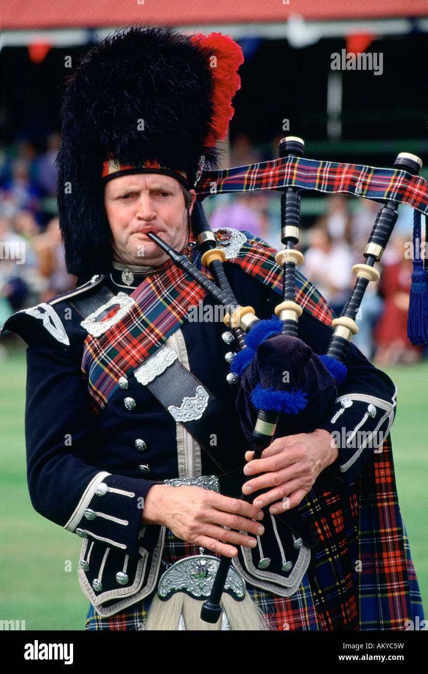 Bagpipe player at the Braemar Games SCOTLAND Stock Photo