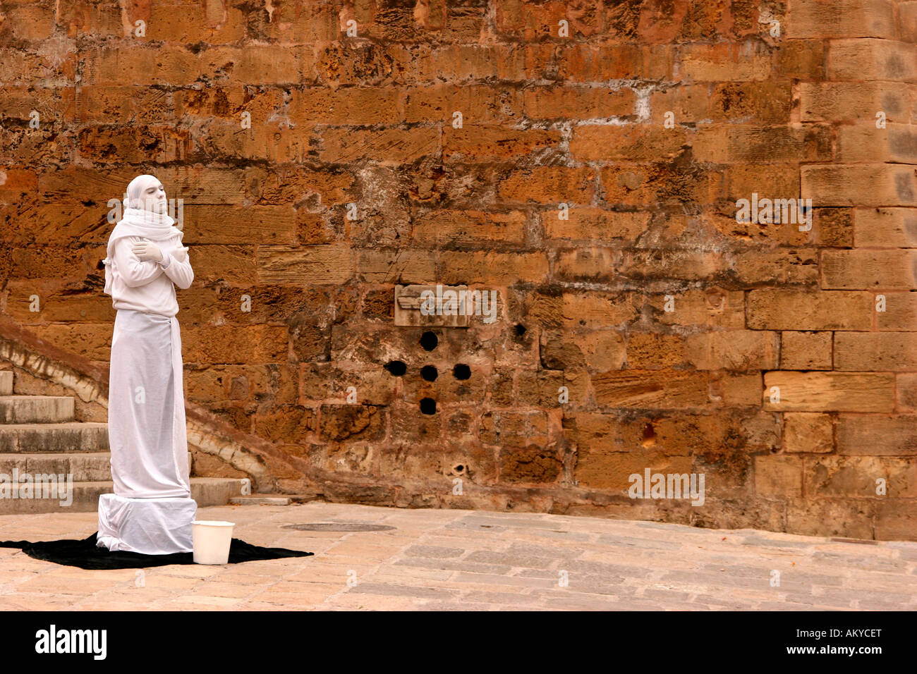 Street performer with white clothes and make up in the old town, Palma de Mallorca, Majorca, Spain, Europe Stock Photo