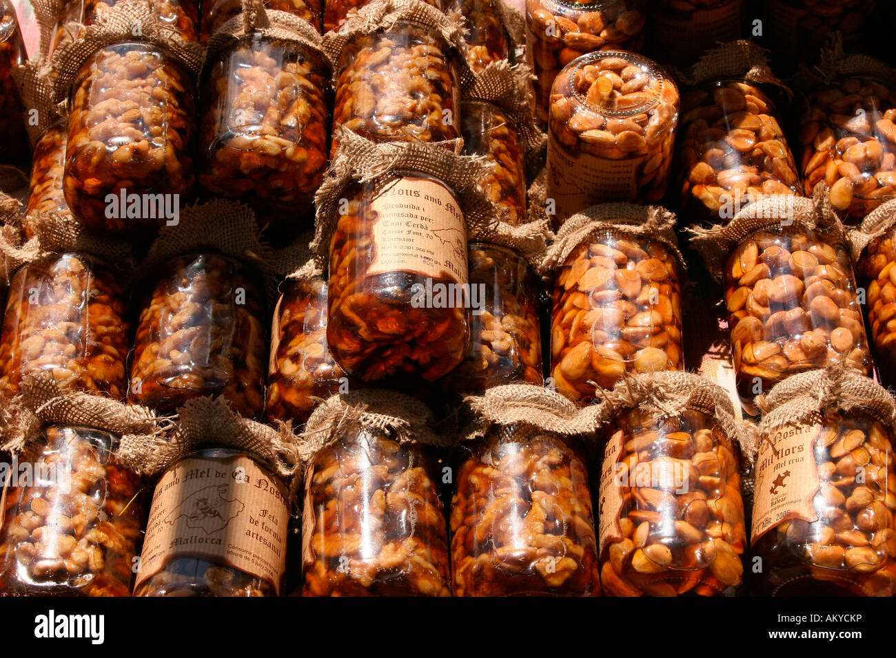 Preserving glasses with nuts in honey on a market, Sineu, Majorca, Spain, Europe Stock Photo