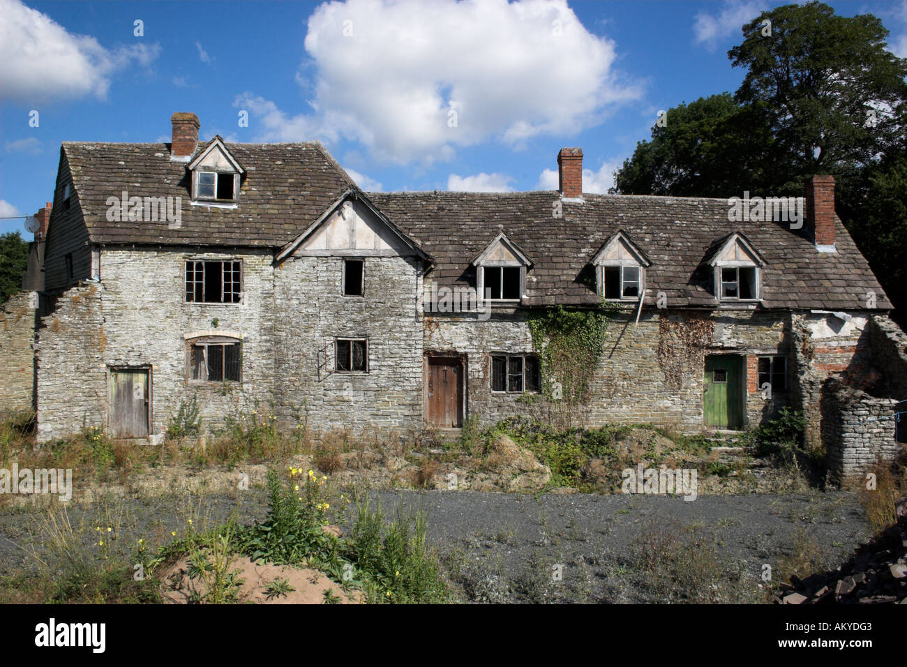 Row Of Derelict Farm Cottages In Powys Wales Uk Stock Photo