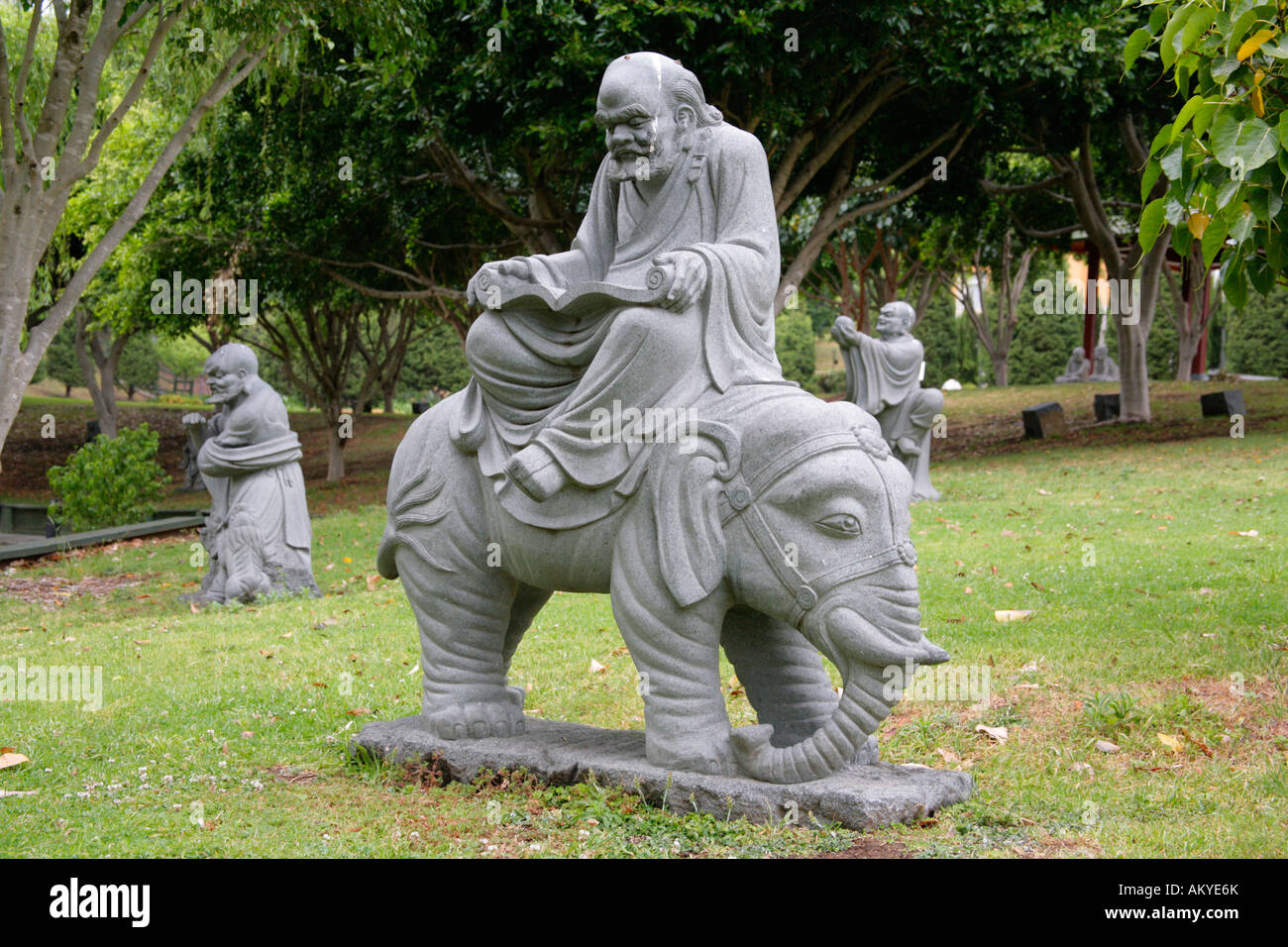 Statue of ancient  Chinese sage on elephant in grounds of  Nan Tien Buddhist Temple,Berkeley,New South Wales. Stock Photo