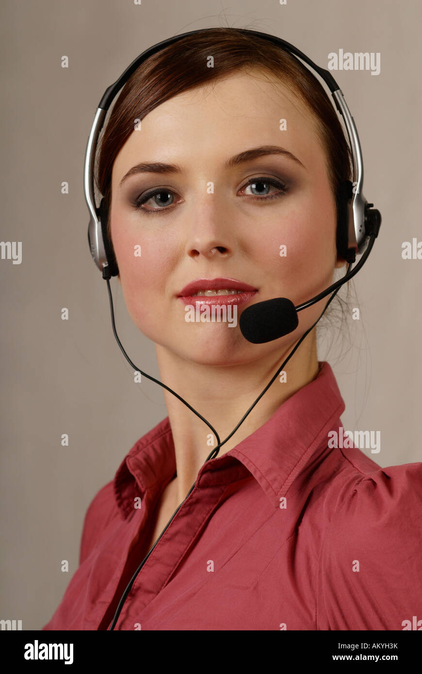 Young woman with headset, call center, telephone operator Stock Photo