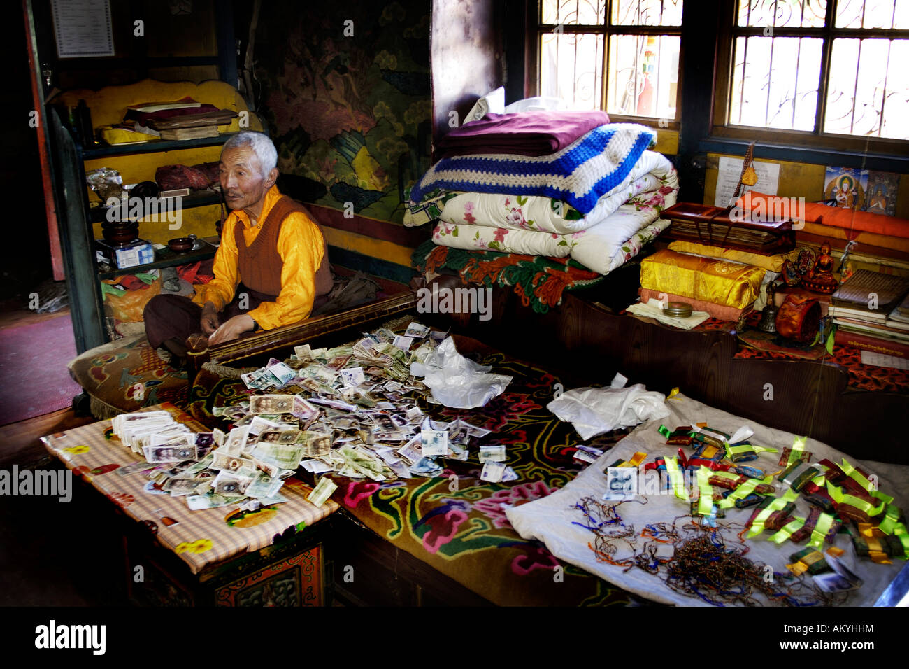 Monk money donation yumbo lhakang hires stock photography and images