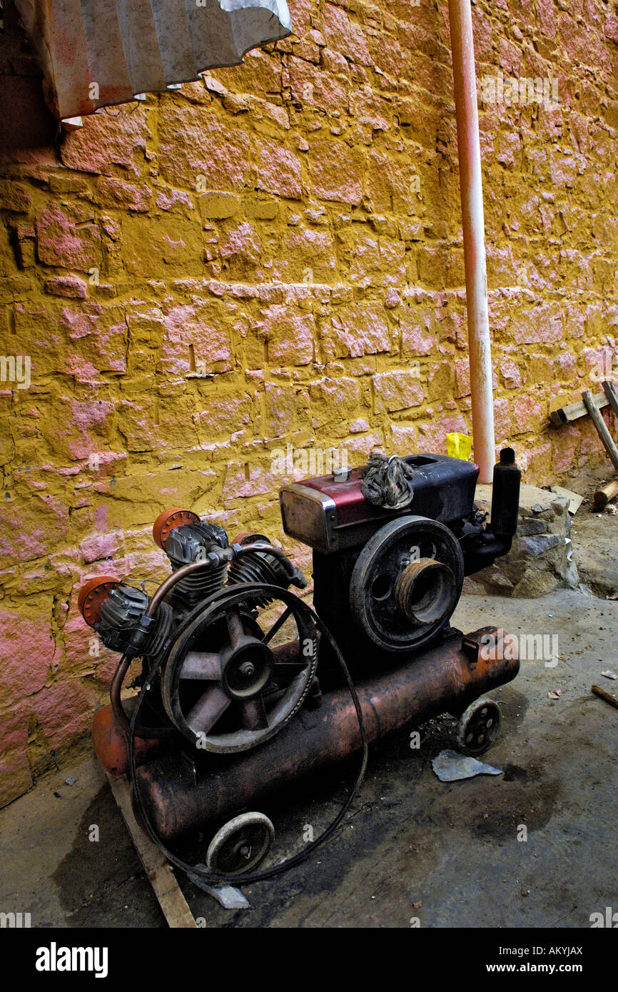 Old fashioned compressor, Tibet Stock Photo