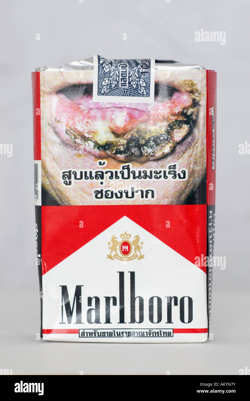 Warning notice on a cigarette box, Thailand Stock Photo