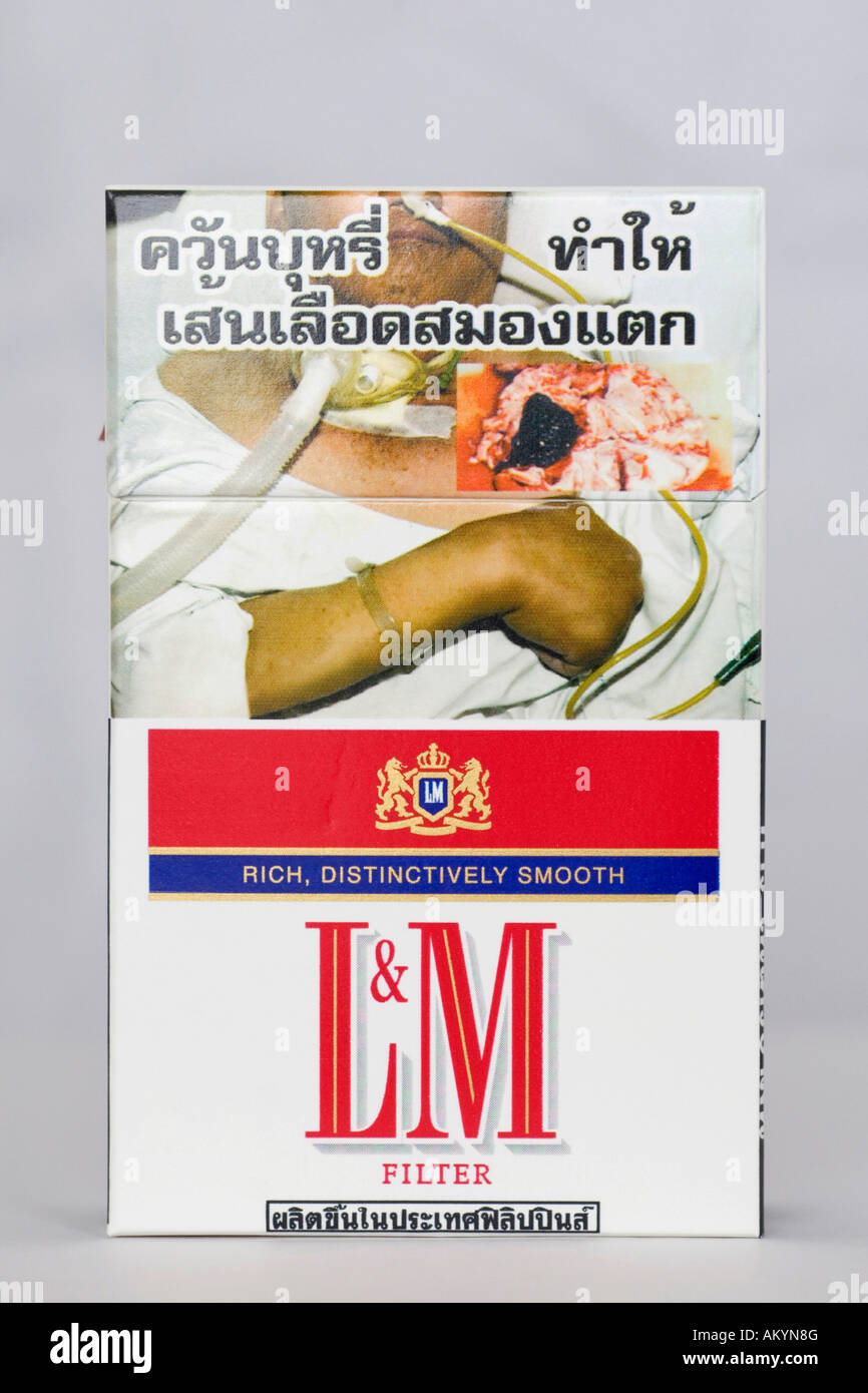 Warning notice on a cigarette box, Thailand Stock Photo