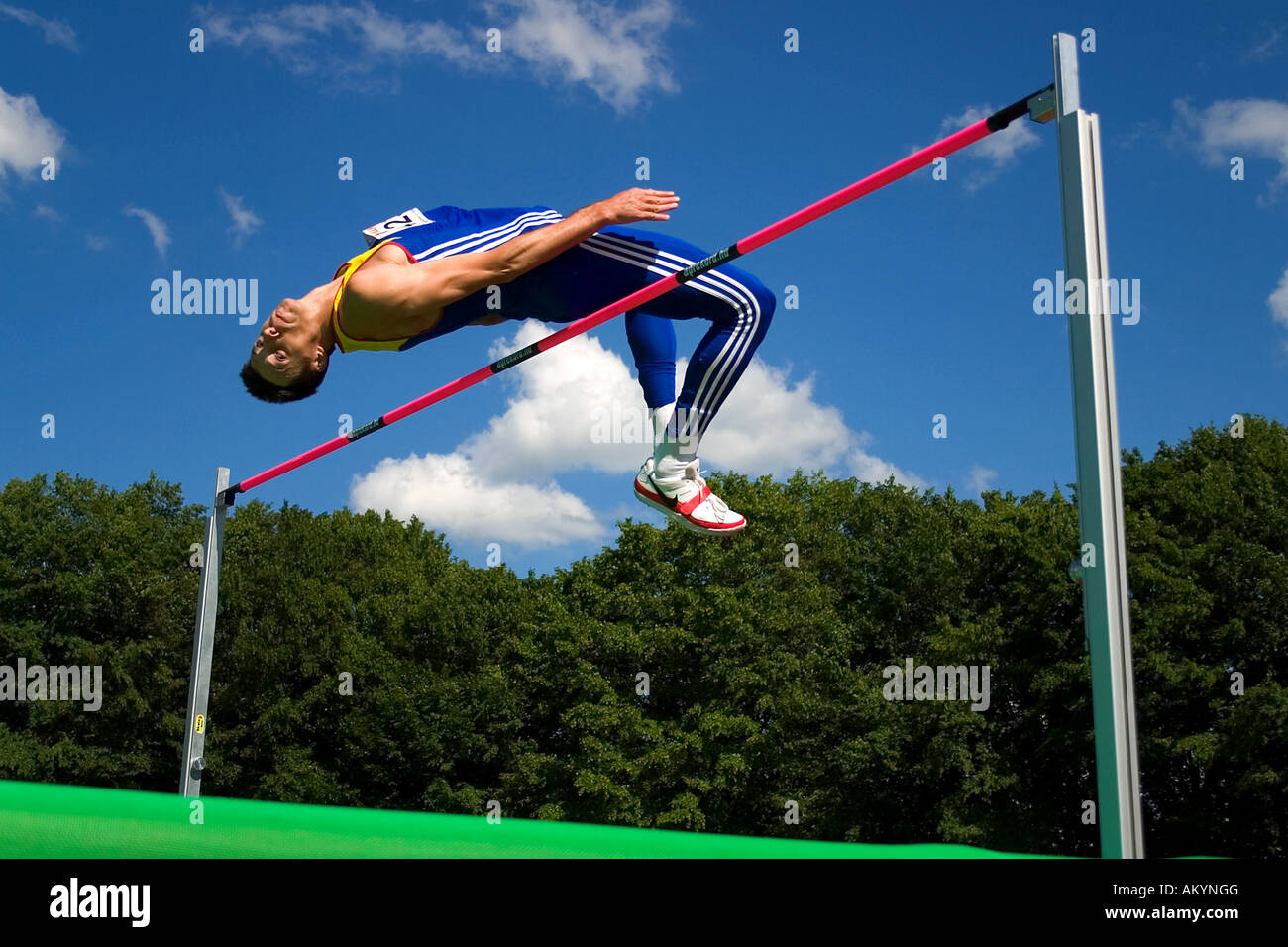 High jumper crossing the bar Stock Photo Alamy