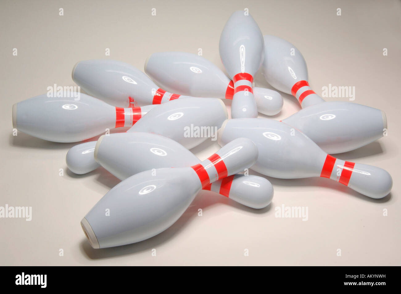 Bowled over bowling pins Stock Photo