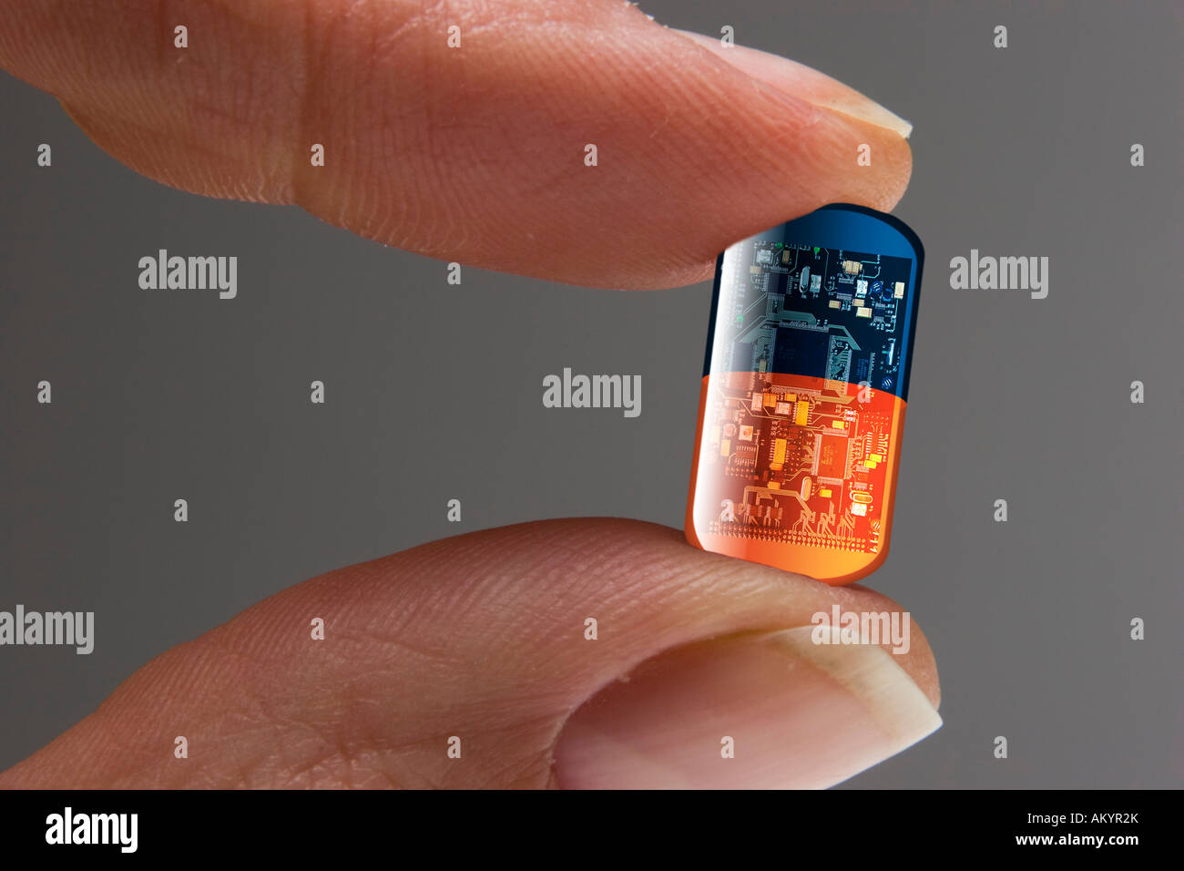Medicine capsule with chip Stock Photo - Alamy
